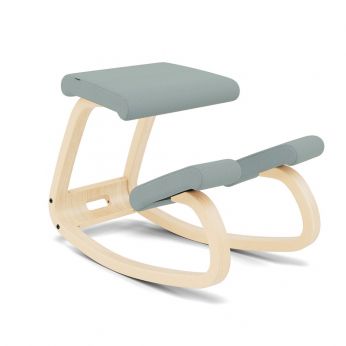 Variable Balans - Ergonomic chair by Varier with natural ash frame and light green Tonal fabric seat.